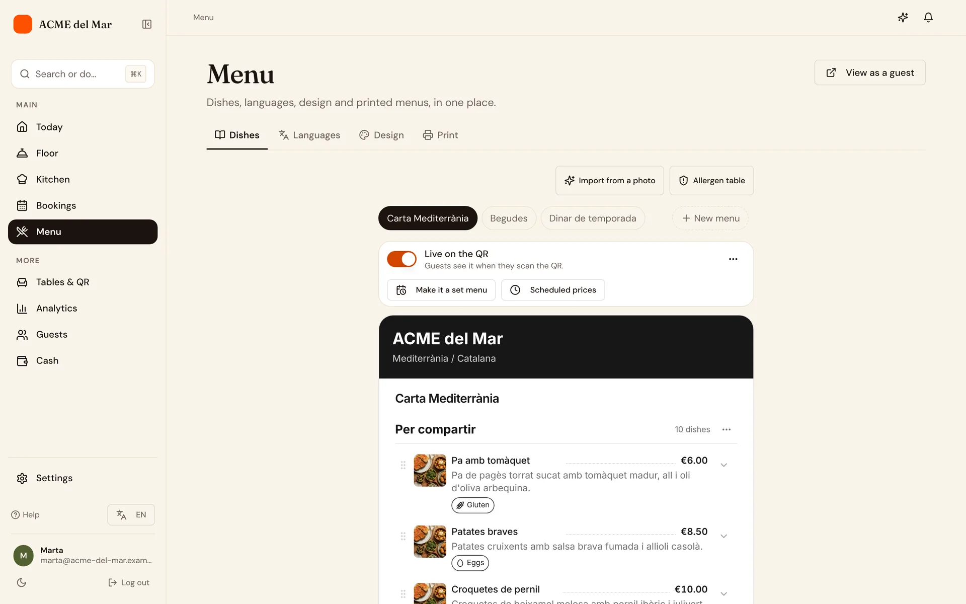 The ComidaQR menu editor with sections and dishes